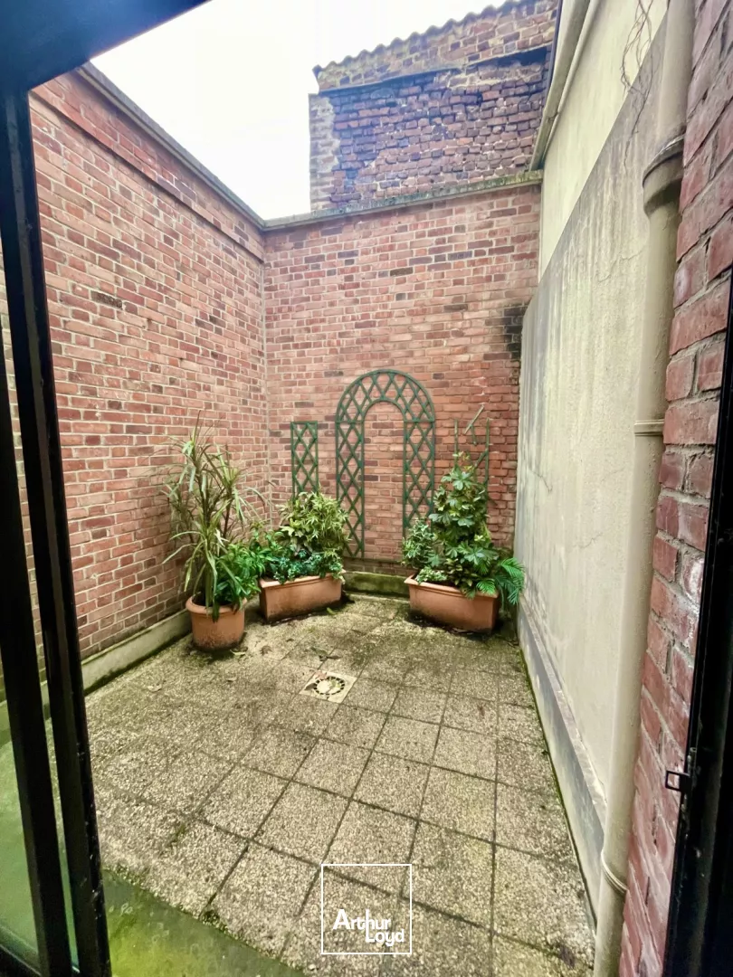 Bureaux à vendre Lomme - 230 m² lumineux avec visibilité exceptionnelle et patio privatif