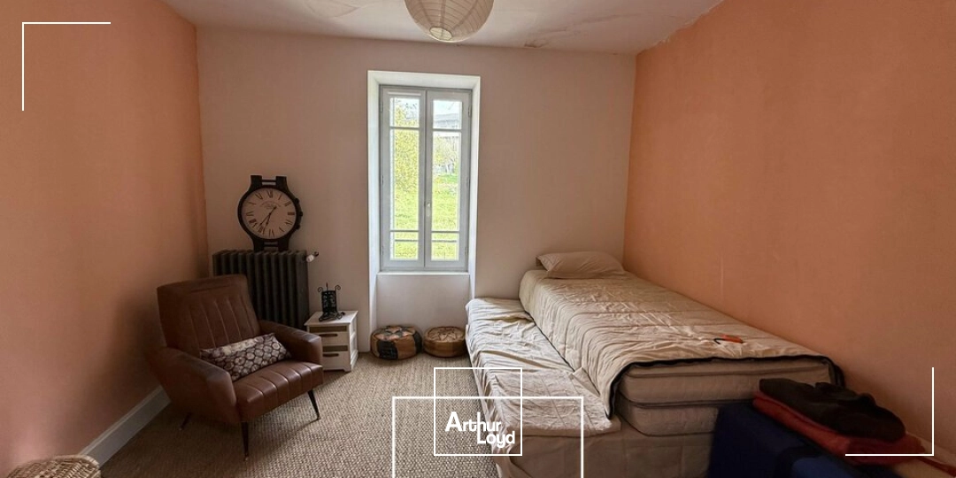 Immeuble de rapport avec local commercial et appartements rénovés